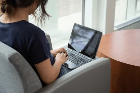 student on a computer